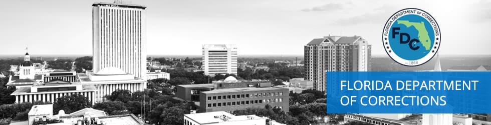 A cityscape with tall buildings, including a skyscraper and a large blue sign that says "FLOOR OF COMMERCE" in the foreground.